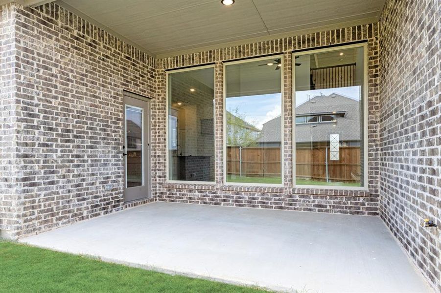 Exterior details and patio area of a home in Creekview Meadows, Pilot Point (Image 3). Exterior details and patio area of a home in Creekview Meadows, Pilot Point (Image 3).