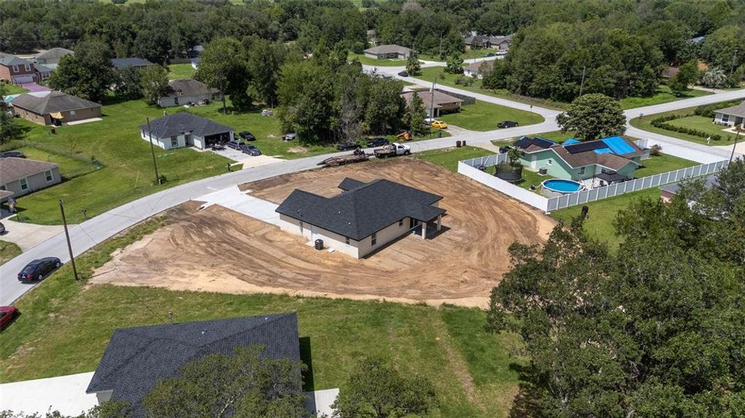 Front exterior of a new home in , Ocala, FL, highlighting curb appeal (Image 26). Front exterior of a new home in , Ocala, FL, highlighting curb appeal (Image 26).