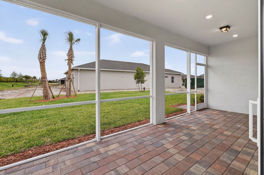 Exterior details and patio area of a home in Del Webb Tradition, Port St. Lucie (Image 4).
