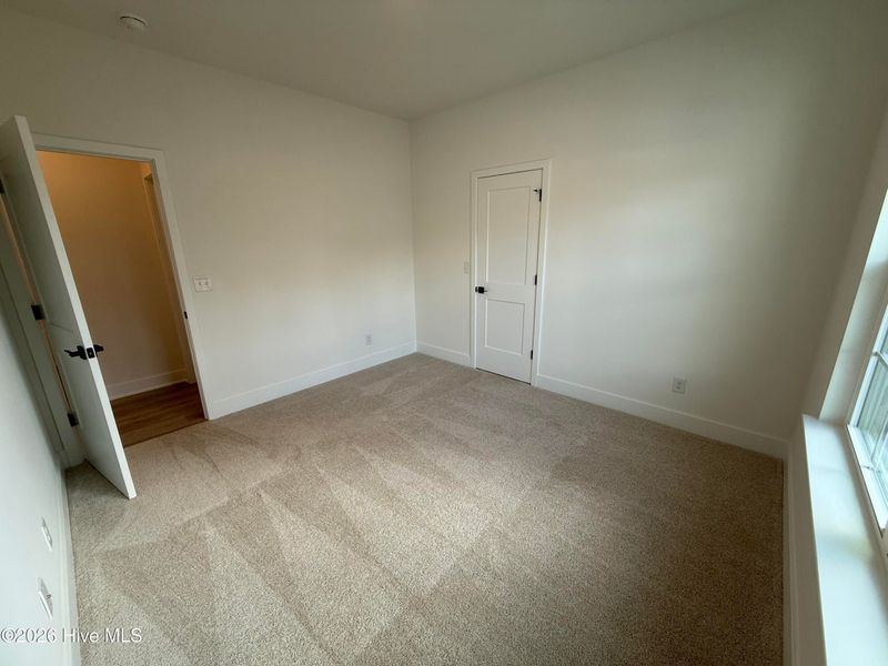 Spacious, unfurnished interior of a new home in Wood Creek Landing, Leland (Image 26). Spacious, unfurnished interior of a new home in Wood Creek Landing, Leland (Image 26).
