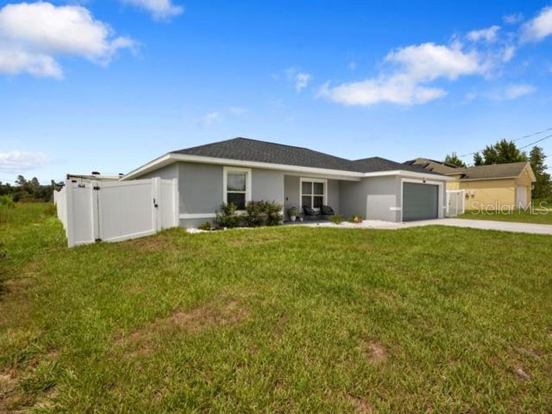 Front exterior of a new home in , Ocala, FL, highlighting curb appeal (Image 19).