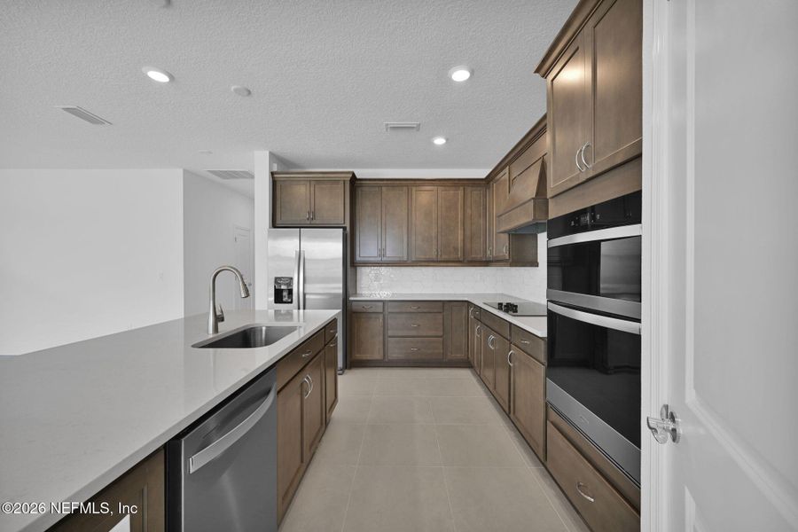 Furnished interior view inside a new home in Hyland Trail, Green Cove Springs (Image 7).