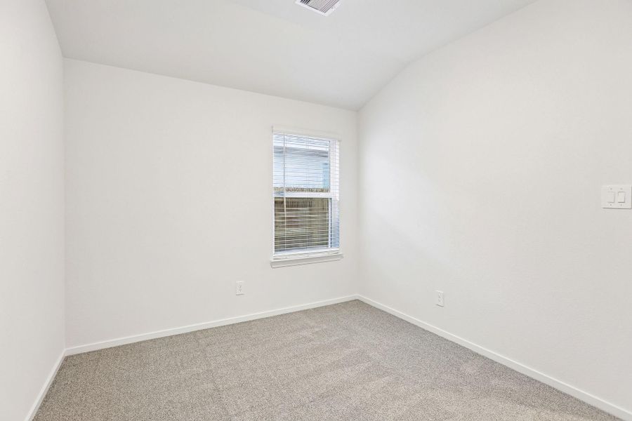 Spacious, unfurnished interior of a new home in Riviera Pines - Traditional Series, Conroe (Image 24).