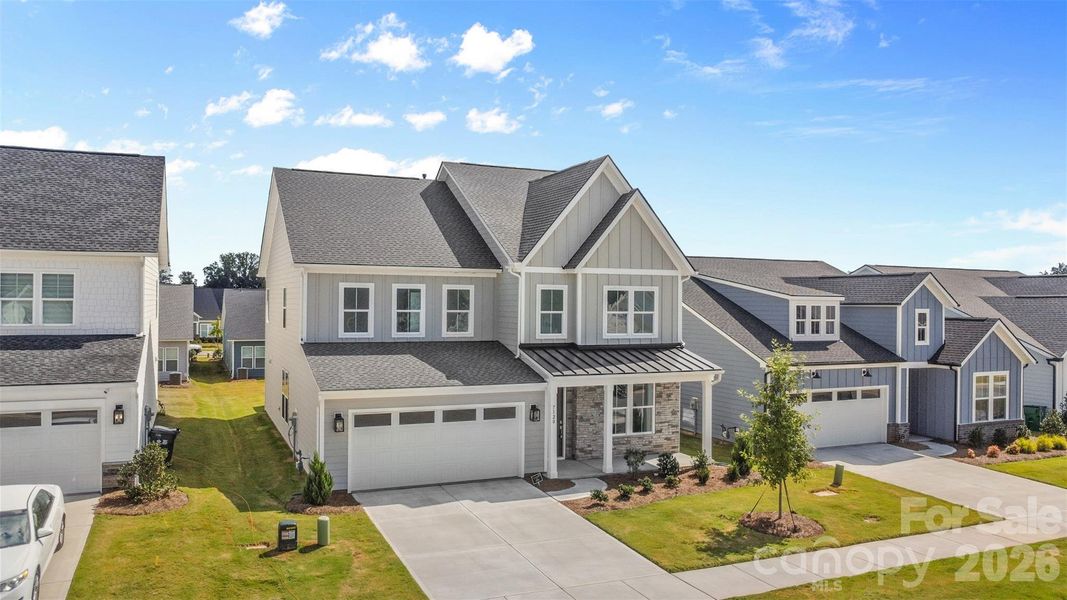 Front exterior of a new home in , Charlotte, NC, highlighting curb appeal (Image 1). Front exterior of a new home in , Charlotte, NC, highlighting curb appeal (Image 1).