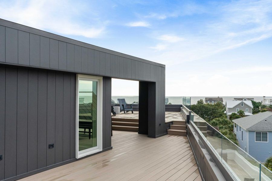 Exterior details and patio area of a home in , Isle Of Palms (Image 36).