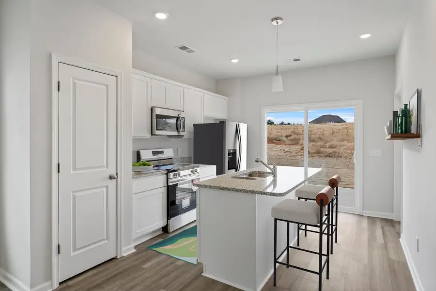 Representative furnished interior of a home built from the Baker - Genesis Value Collection by Mungo Homes in Hidden Springs, Lexington (Image 3).