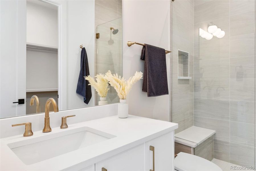 En suite bath for 3rd of 3 bedrooms on upper level