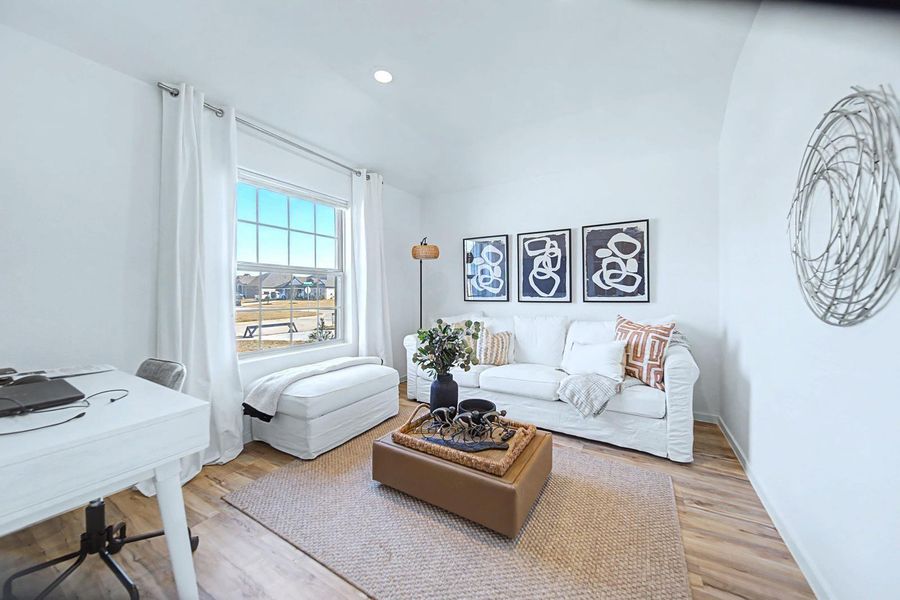 Furnished interior view inside a new home in Pinewood at Grand Texas, New Caney (Image 13).