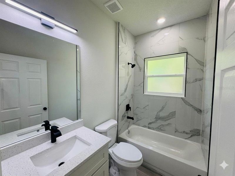 Furnished interior view inside a new home in , Dunnellon (Image 11).