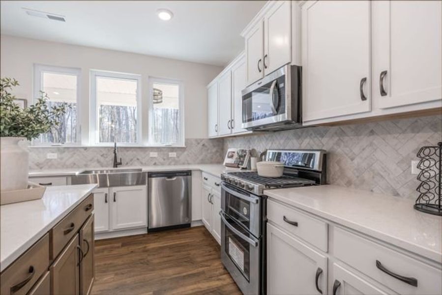 Representative furnished interior of a home built from the Lenox by True Homes in Whispering Hills, Locust (Image 5).