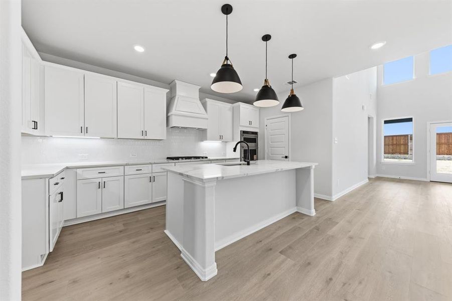 Beautiful cabinetry, lovely backsplash, gorgeous countertops, stainless appliances....what more could you ask for in your dream kitchen?