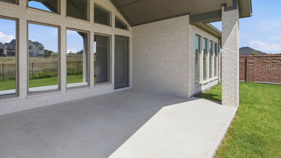 Exterior details and patio area of a home in Sweetgrass, Haslet (Image 4). Exterior details and patio area of a home in Sweetgrass, Haslet (Image 4).