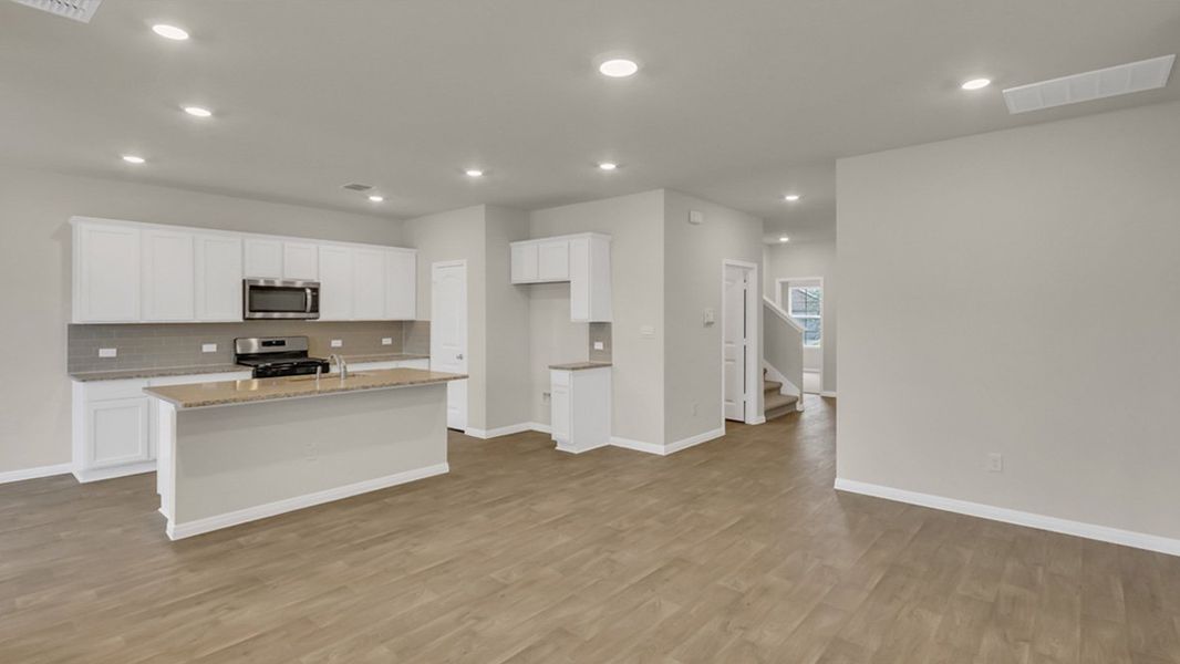 Furnished interior view inside a new home in Rosenbusch Ranch, Leander (Image 4). Furnished interior view inside a new home in Rosenbusch Ranch, Leander (Image 4).