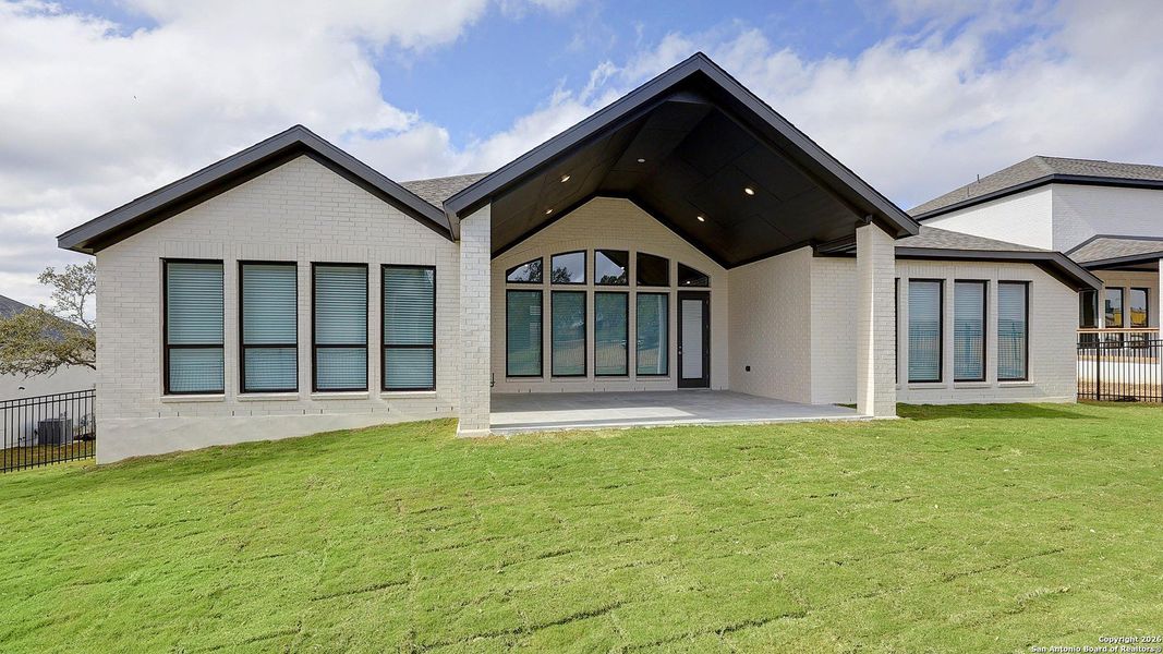 Exterior details and patio area of a home in Esperanza 80', Boerne (Image 3).
