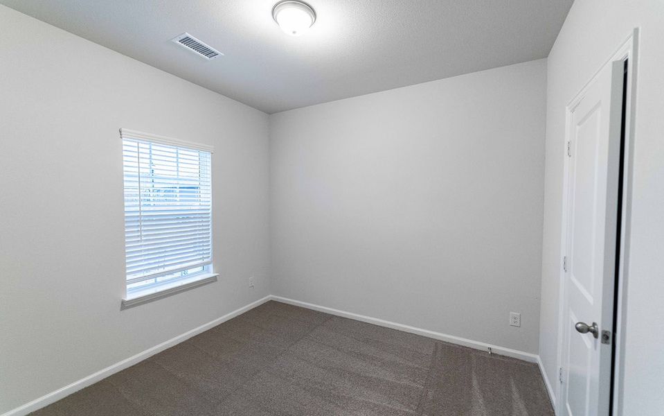 Spacious, unfurnished interior of a new home in The Grove, Sherman (Image 12).