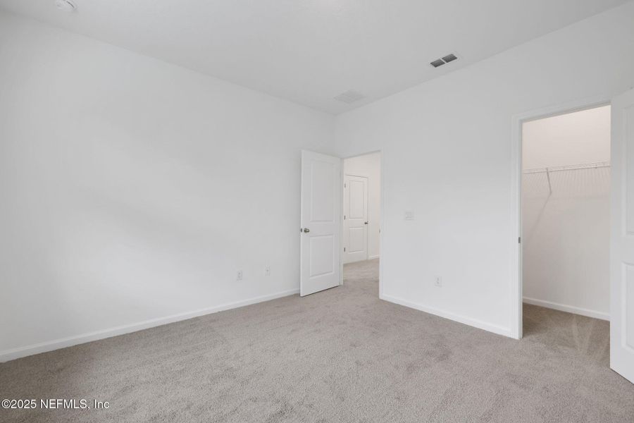 Spacious, unfurnished interior of a new home in The Hammock at Palm Harbor, Palm Coast (Image 25).