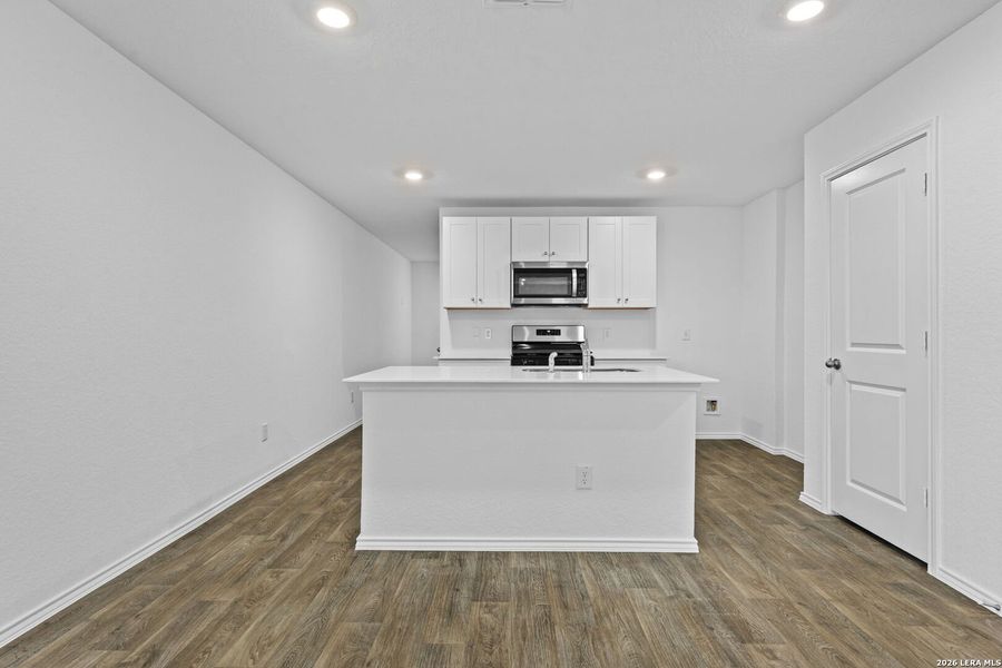 Furnished interior view inside a new home in Applewood, San Antonio (Image 6).