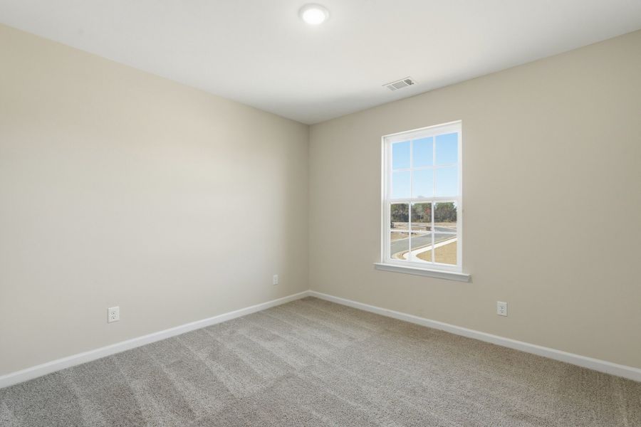 Representative unfurnished interior of a home built from the The Chatman by RTS Homes in The Gardens at 15 West, Hinesville (Image 41).