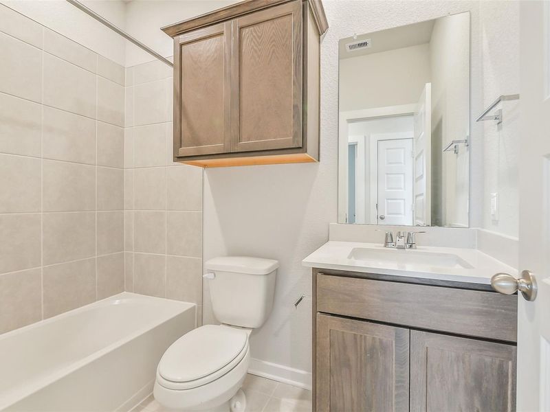 Furnished interior view inside a new home in Spring Branch Crossing, Conroe (Image 20).