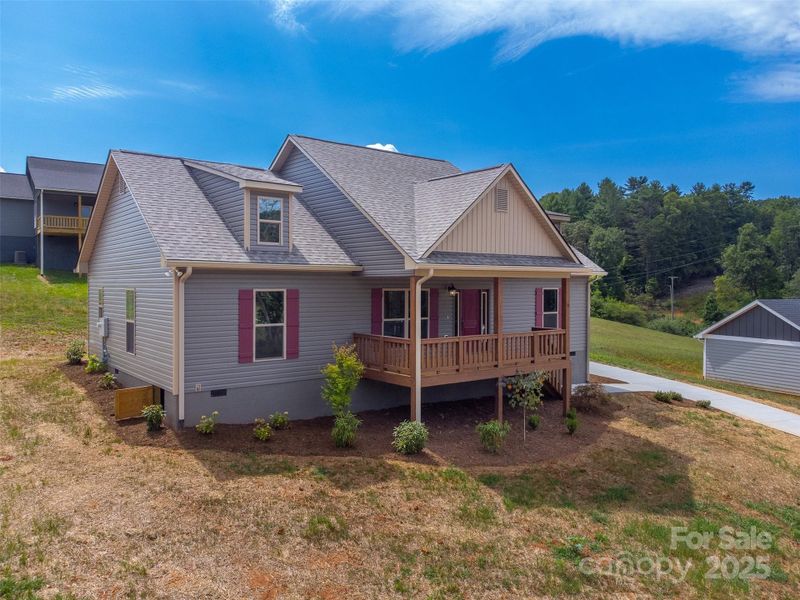 Front exterior of a new home in , Franklin, NC, highlighting curb appeal (Image 27).