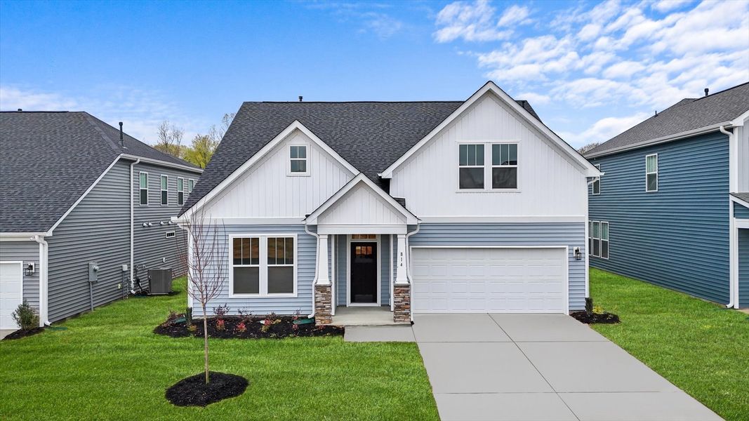 Representative exterior photo of a completed home built from the Cooper 3 by DRB Homes in Iris Meadows, Moore, SC (Image 22).