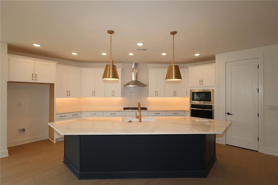Furnished interior view inside a new home in Maple Grove at Towne Lake, Woodstock (Image 5).