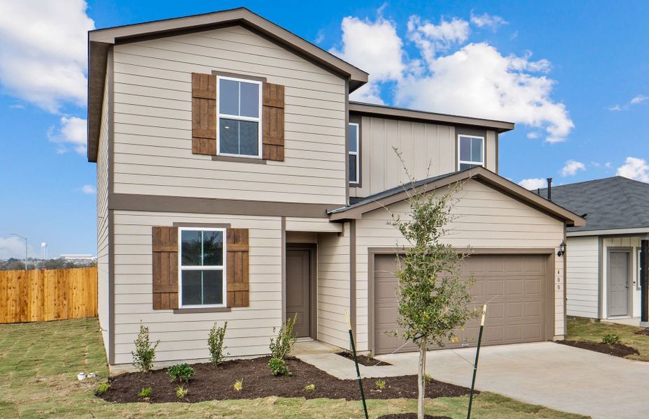 Front exterior of a new home in Larson Crossing, Elgin, TX, highlighting curb appeal (Image 19).