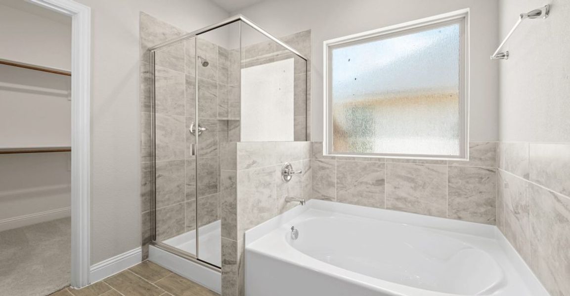 Representative exterior photo of a completed home built from the Donnington by Impression Homes in Still Water Lake, Godley, TX (Image 15).