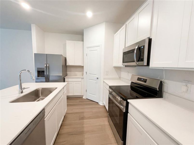 Furnished interior view inside a new home in Grand Park, Dunnellon (Image 9).