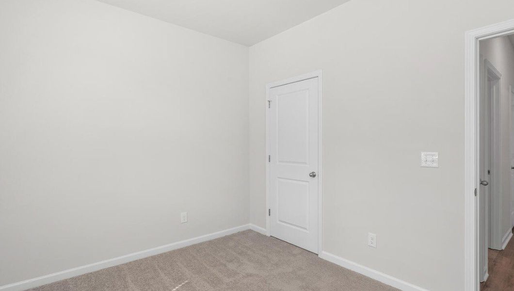 Representative unfurnished interior of a home built from the Macon by D.R. Horton in Vineyard Trail, Jacksonville (Image 20).