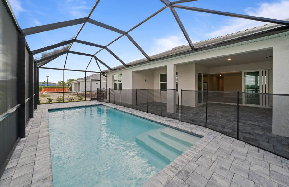 Exterior details and patio area of a home in Del Webb Oak Creek, North Fort Myers (Image 22).