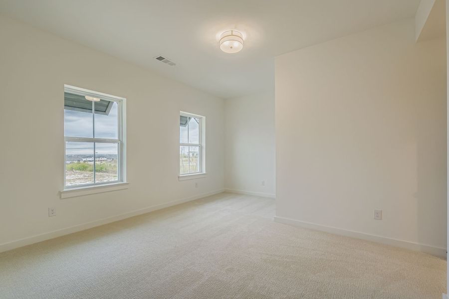 Spacious, unfurnished interior of a new home in Castle Hills Northpointe - Townhomes, Lewisville (Image 21).