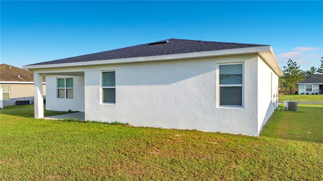 Exterior details and patio area of a home in , Ocala (Image 24).