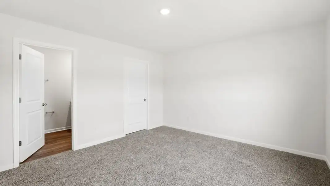Spacious, unfurnished interior of a new home in Waverly Station, Greenwood (Image 31).