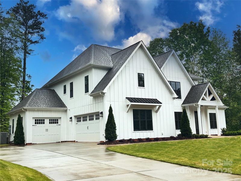 Front exterior of a new home in , Sherrills Ford, NC, highlighting curb appeal (Image 23). Front exterior of a new home in , Sherrills Ford, NC, highlighting curb appeal (Image 23).