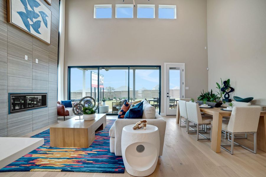Living room featuring a fireplace and light wood-type flooring