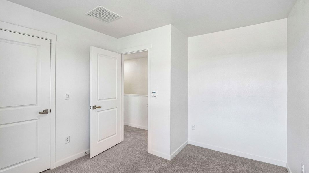 Spacious, unfurnished interior of a new home in Prairie Song, Windsor (Image 17).