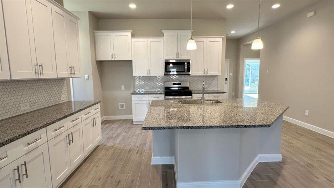 Furnished interior view inside a new home in Rock Creek West, Fort Worth (Image 6). Furnished interior view inside a new home in Rock Creek West, Fort Worth (Image 6).