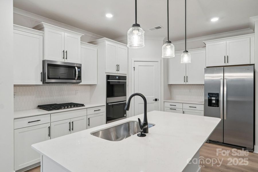 Furnished interior view inside a new home in Oak Grove Hill, Huntersville (Image 6).