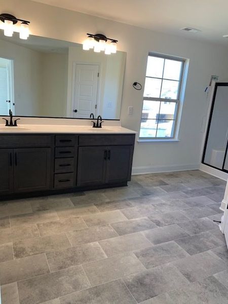 Furnished interior view inside a new home in Royal Pines, Trinity (Image 9).