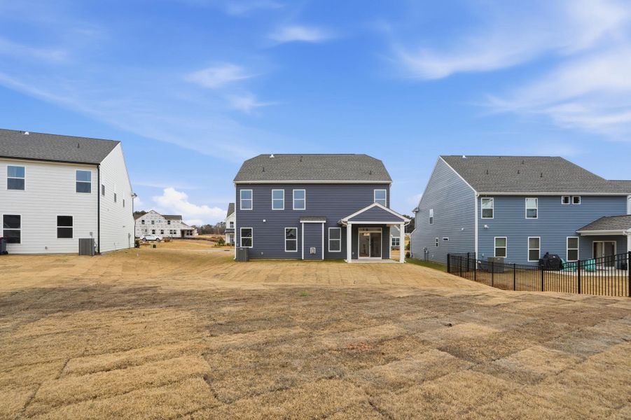 Exterior details and patio area of a home in Carrington, Stanley (Image 42).