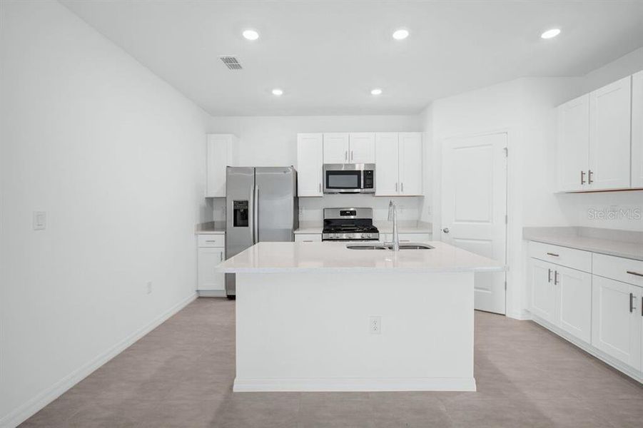 Furnished interior view inside a new home in Cove at Coasterra, Palmetto (Image 9).
