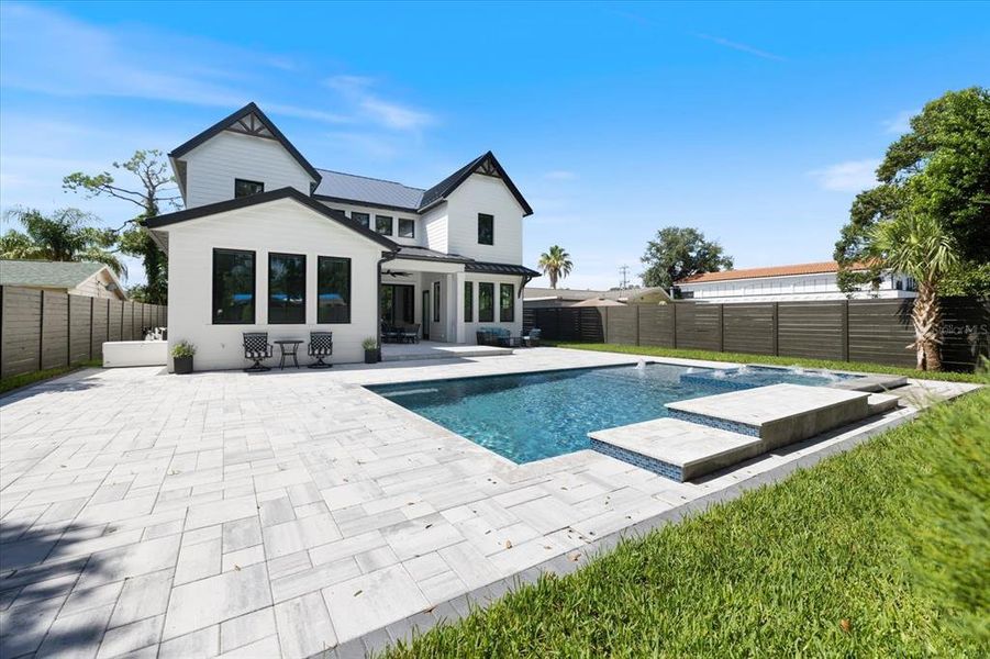 Exterior details and patio area of a home in , Sarasota (Image 29).