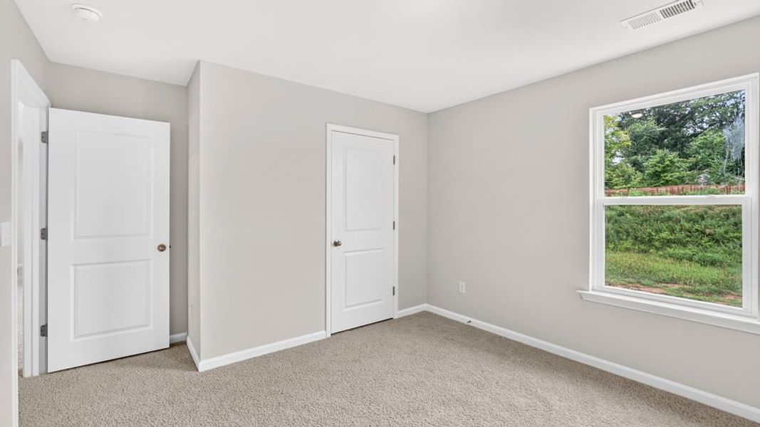 Spacious, unfurnished interior of a new home in Harrier Point, Woodruff (Image 29).