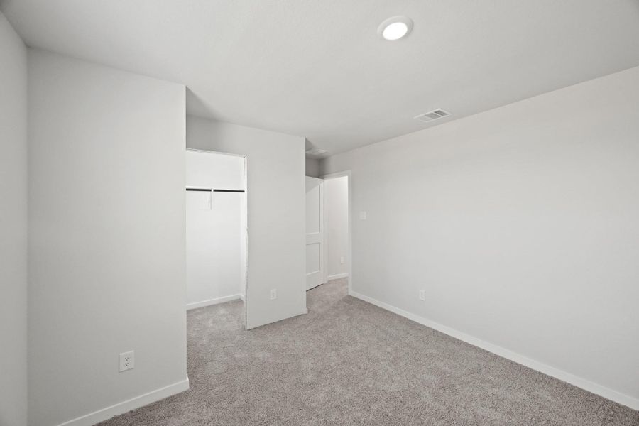 Spacious, unfurnished interior of a new home in Lonestar Collection at Paloma at Sanford Farms, Waller (Image 17).