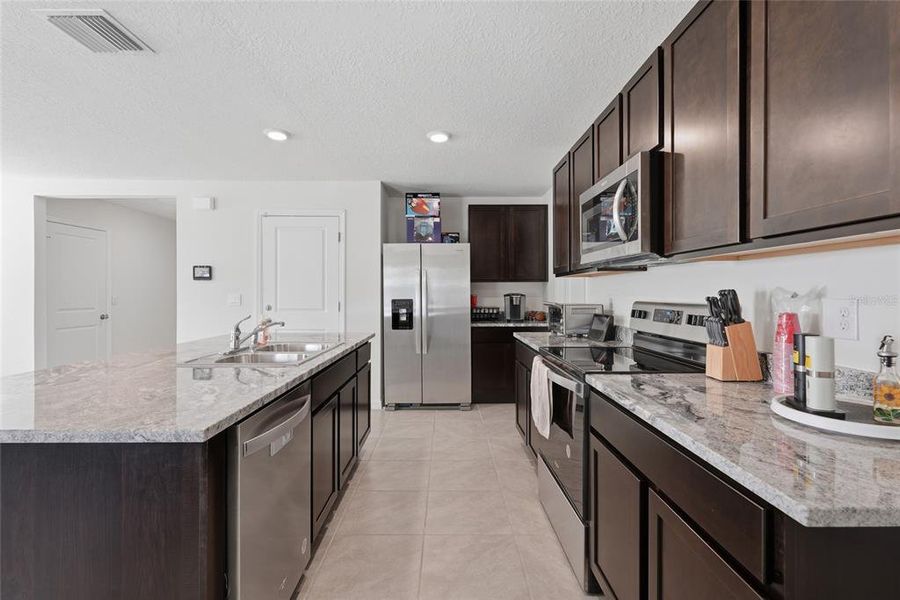 Furnished interior view inside a new home in Avalon Woods, Newberry (Image 17).