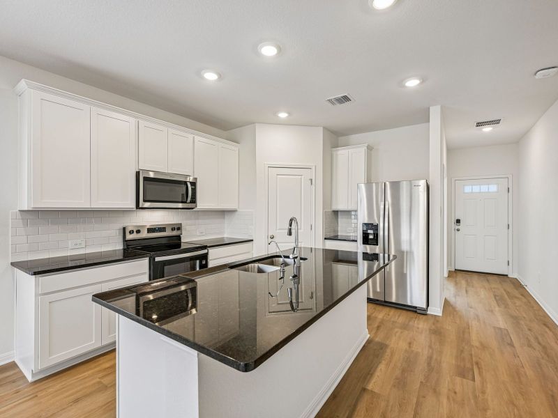Furnished interior view inside a new home in Eastern Wells, Jarrell (Image 3).