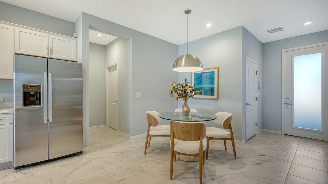 Furnished interior view inside a new home in Grand Park Real Estate and Homes for Sale in Sarasota, FL - Neal Communities, Sarasota (Image 17).