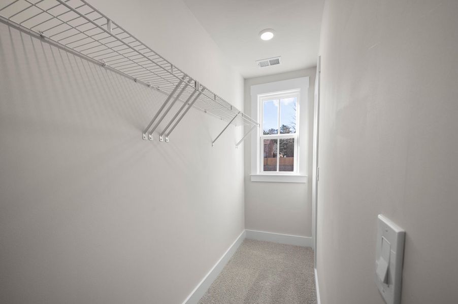 Photo is of a similar home