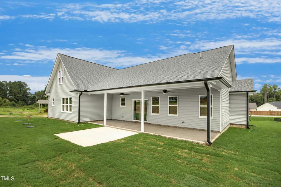 Covered rear porch & concrete patio